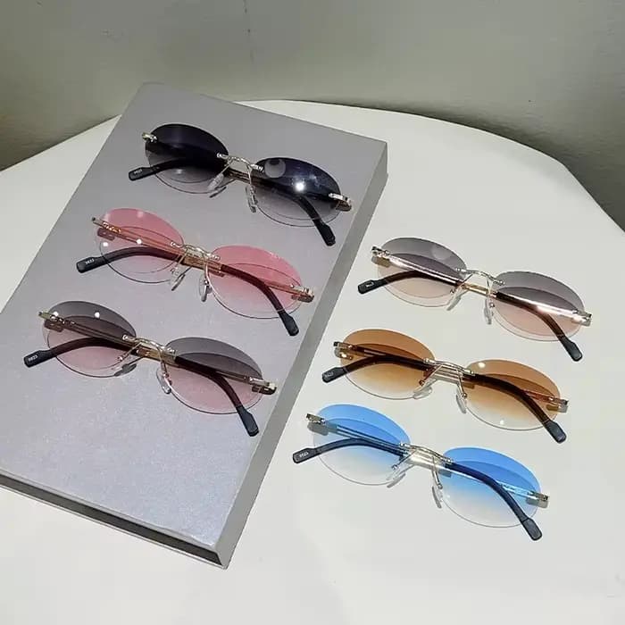 Lunettes de soleil ovales sans monture tendance