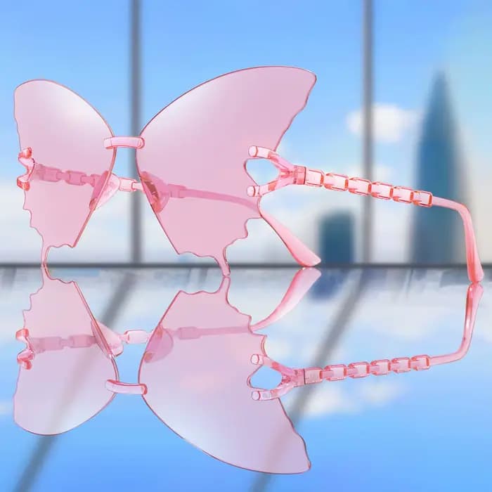 Lunettes de soleil papillon tendance pour femmes et hommes – Monture irrégulière mignonne et décontractée pour le