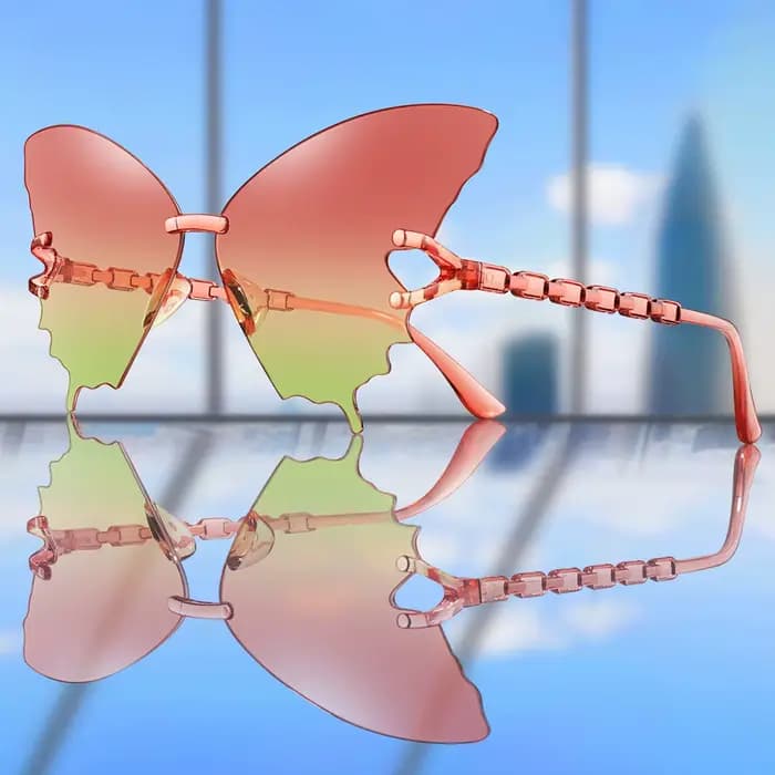 Lunettes de soleil papillon tendance pour femmes et hommes – Monture irrégulière mignonne et décontractée pour le