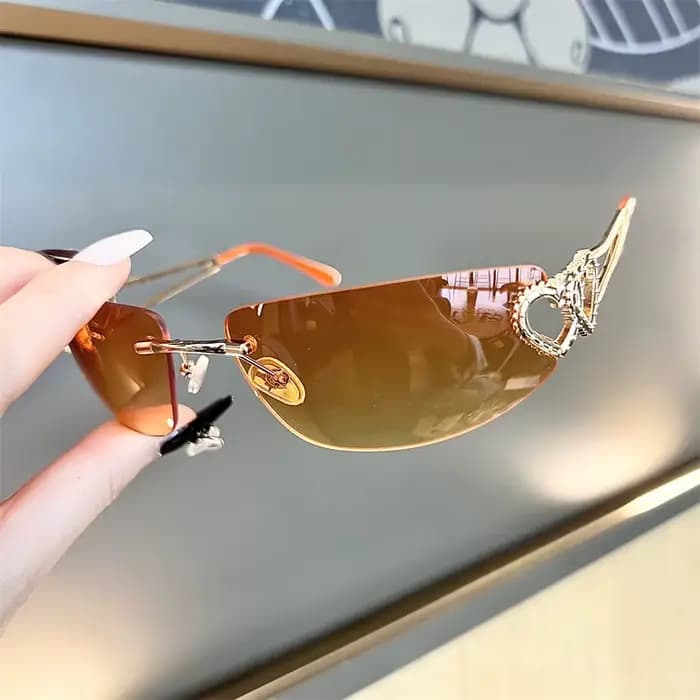 Lunettes de soleil ovales rétro personnalisées sans monture avec découpe en métal en forme de cœur