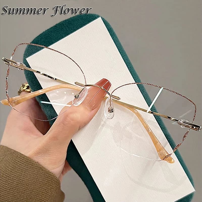 Lunettes sans monture œil de chat pour femmes, lunettes de soleil élégantes, lunettes en titane dura