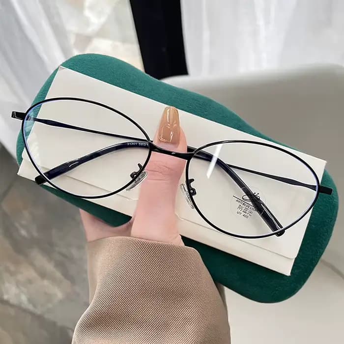 Nouvelle mode lunettes cadre hommes femmes ultraléger Ellipse cadre en métal Anti lumière bleue lent