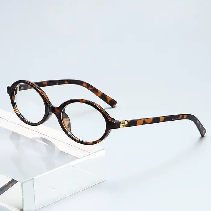 Petites lunettes de soleil ovales tendance à motif léopard pour femme