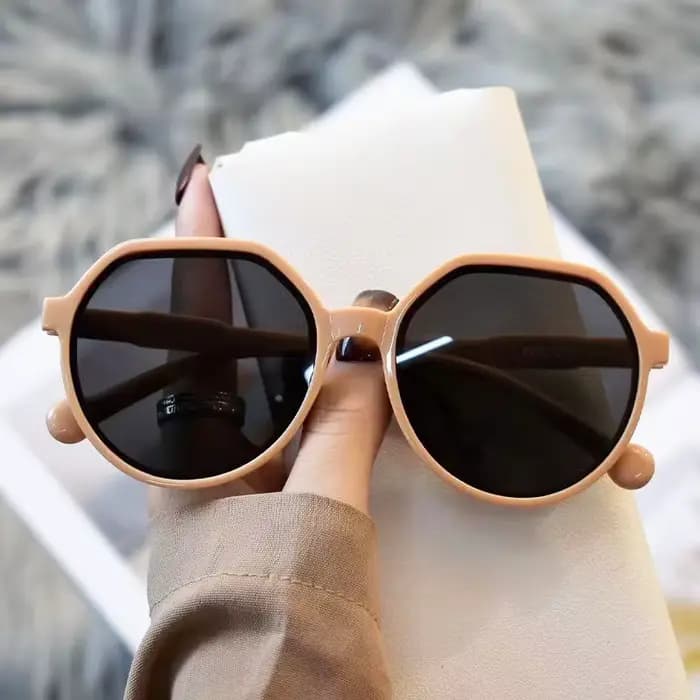 Lunettes de soleil rondes authentiques à monture épaisse