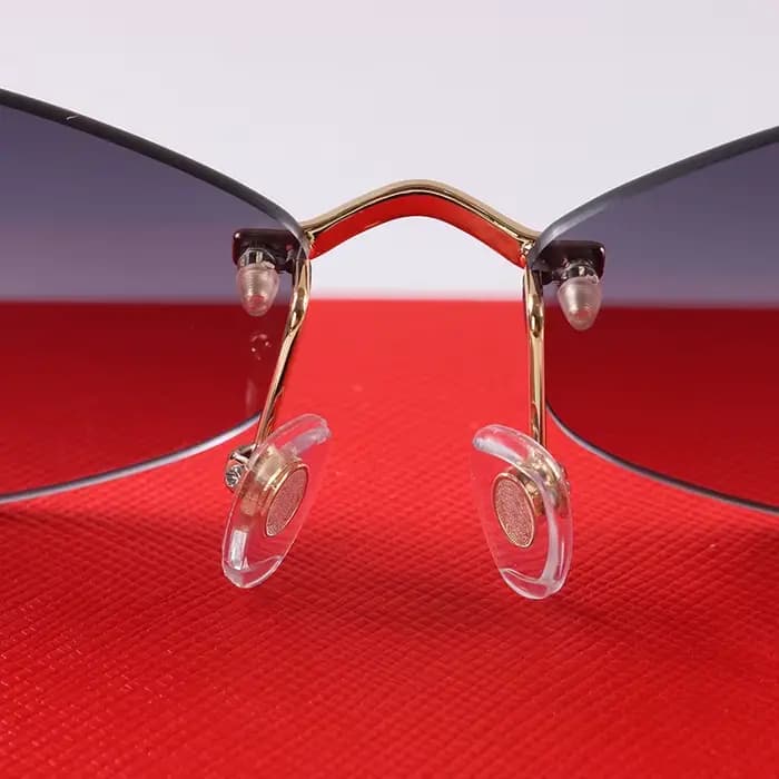 Lunettes de soleil rétro sans monture pour femmes