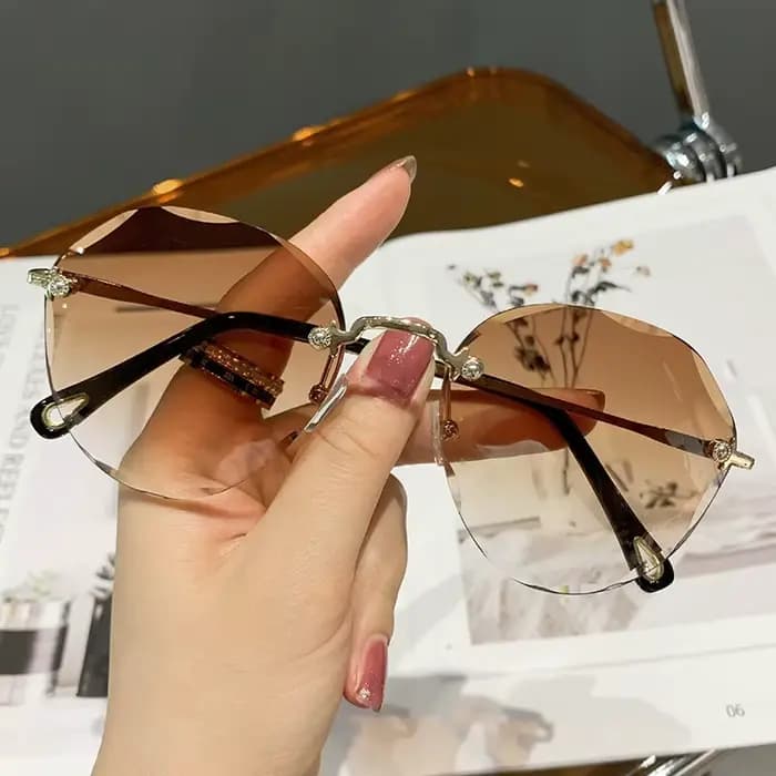 Lunettes de soleil rondes sans monture classiques pour femmes