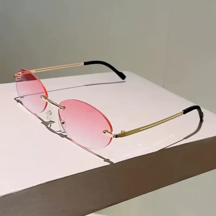 Lunettes de soleil ovales sans monture tendance