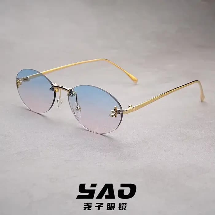 Lunettes de soleil ovales sans bords pour femmes