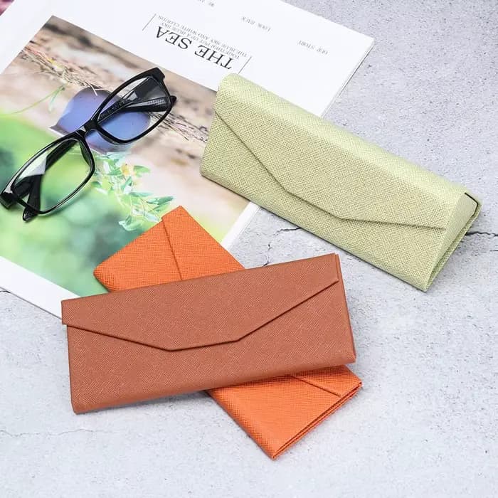 Boîte à lunettes triangulaire pliable unisexe à motif croisé couleur bonbon