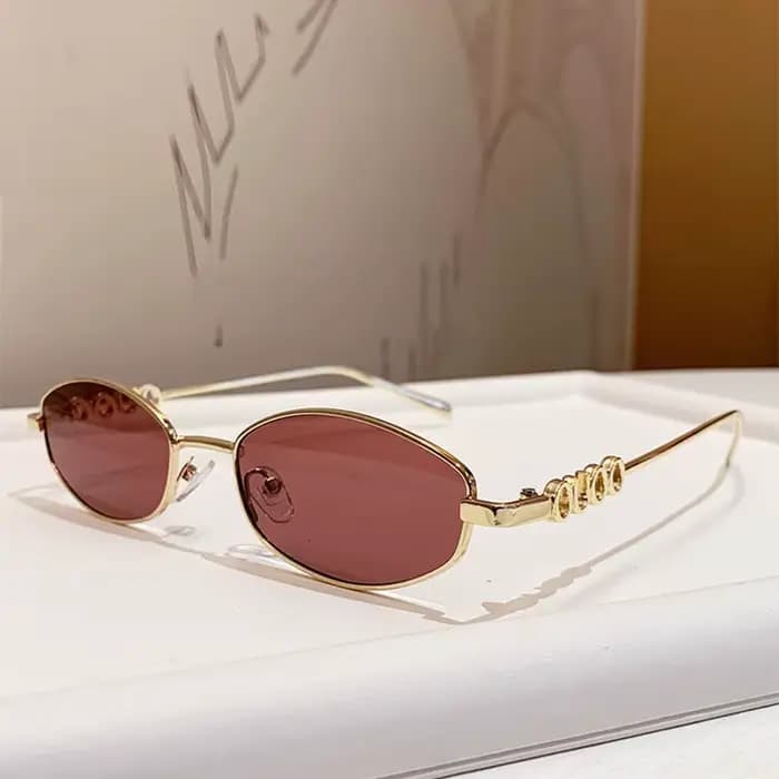 Lunettes de soleil de luxe en métal avec lettres