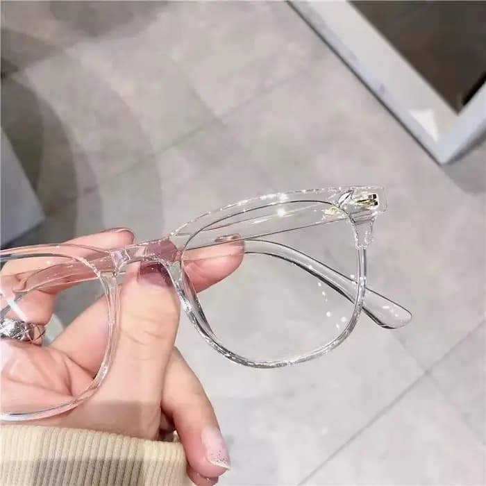 Lunettes à monture ronde à la mode avec verres transparents