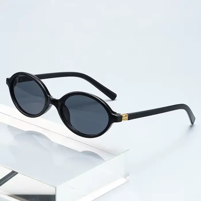 Petites lunettes de soleil ovales tendance à motif léopard pour femme