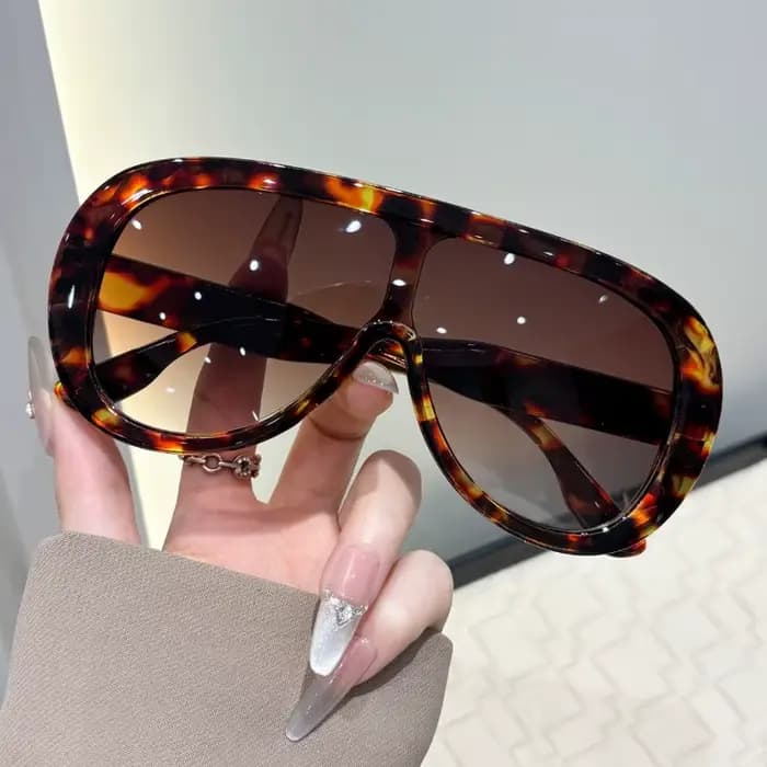 Lunettes de soleil intégrées à grande monture pour femmes
