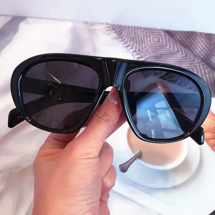 Lunettes de soleil vintage ovales noires à motif léopard pour femmes