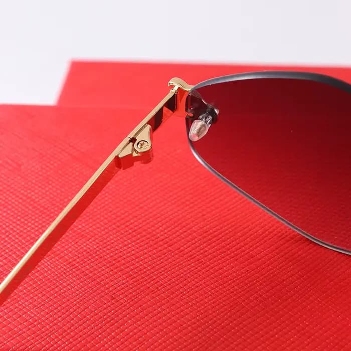 Lunettes de soleil rétro sans monture pour femmes