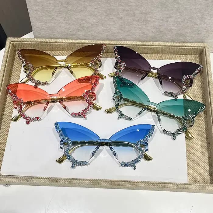 Lunettes de soleil papillon sans monture œil de chat populaires pour femmes et hommes