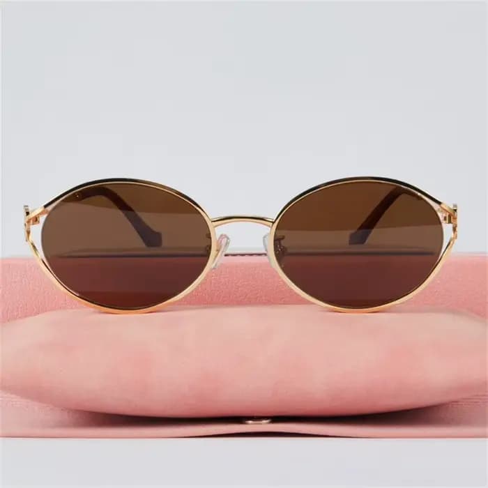 Nouvelles lunettes de soleil ovales à monture en métal marron