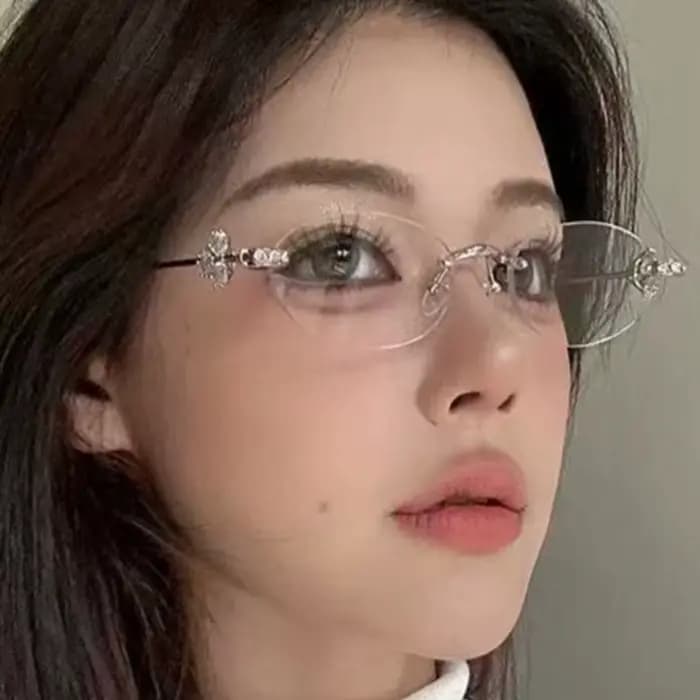 Lunettes de soleil ovales de luxe exquises sans monture