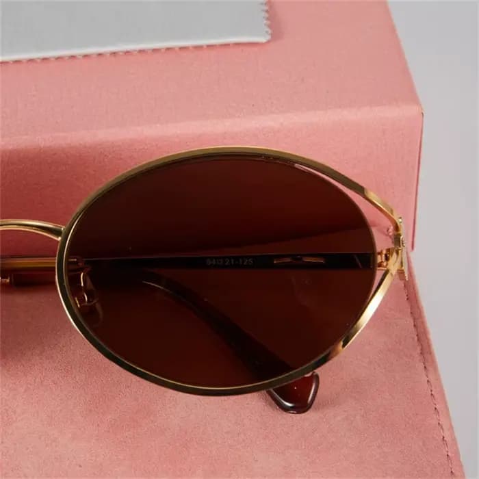 Nouvelles lunettes de soleil ovales à monture en métal marron