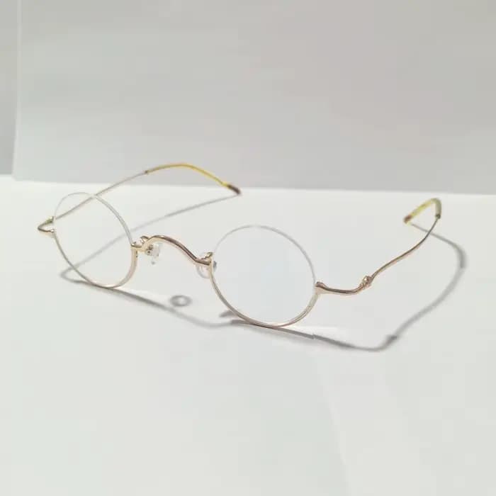 Monture de lunettes demi-cercle dorée en métal