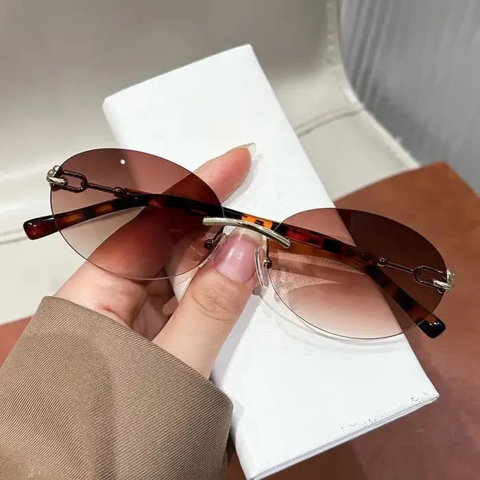 Nouvelles Lunettes de Soleil Rondes Beige Sans Monture 2026 pour Femme