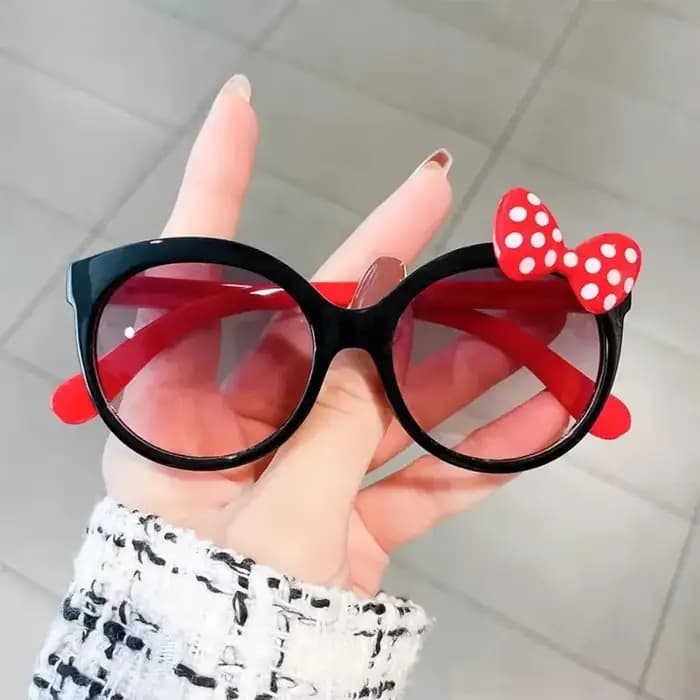 Lunettes de soleil décorées avec nœud en plastique