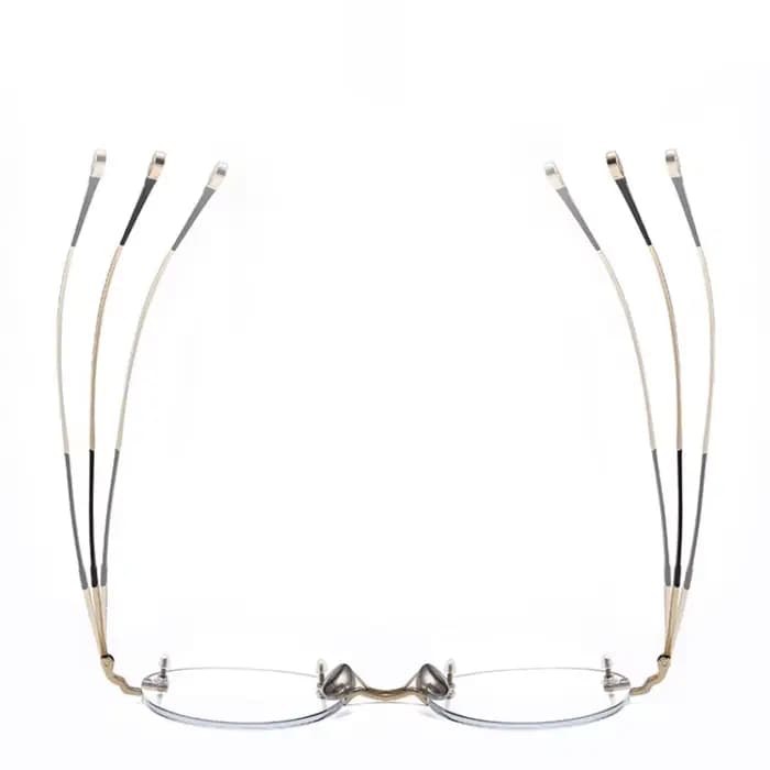YIMARUILI Lunettes Rétro Rondes en Titane Sans Monture pour Hommes et Femmes