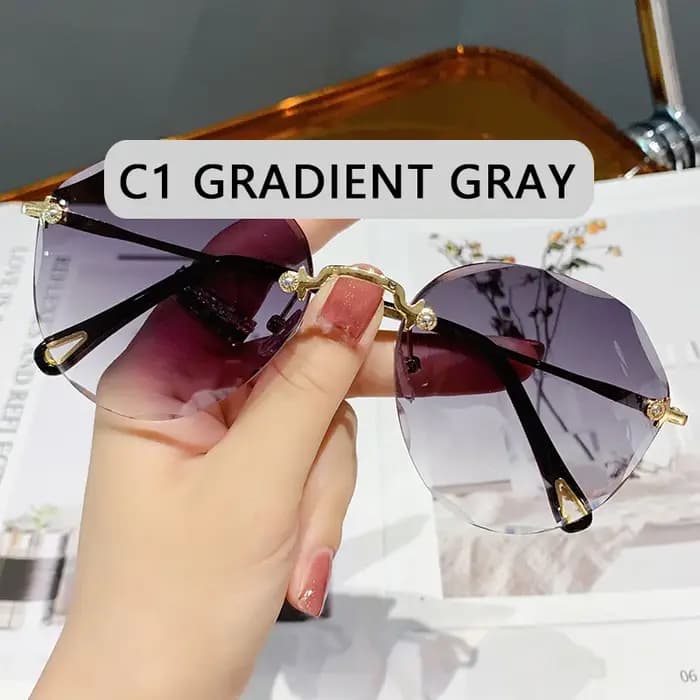 Lunettes de soleil rondes sans monture classiques pour femmes
